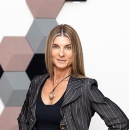 Professional business woman keeping her business running while managing cancer.